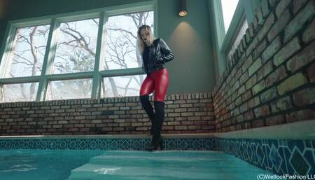 Camille in the Pool wearing a Red and Black Leather Outfit