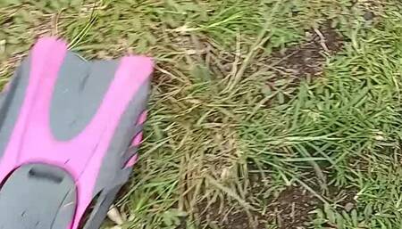 Sexy feet in flipper swimwear Barbie doll pink exotic footwear