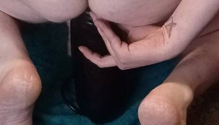 Me using big black toy on my ass