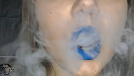 Vaping close-up with blue lipstick