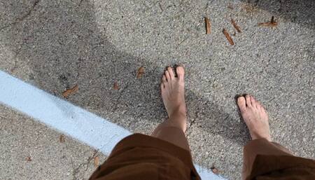 Fifi driving home from the store barefoot and playing with the pedal at red lights