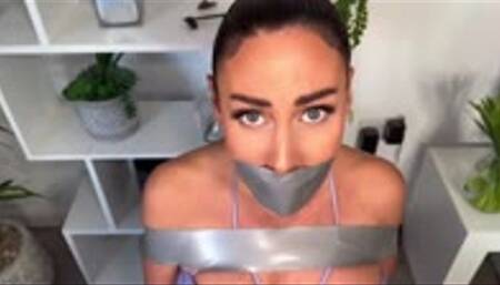 Shackled, handcuffed, taped and gagged