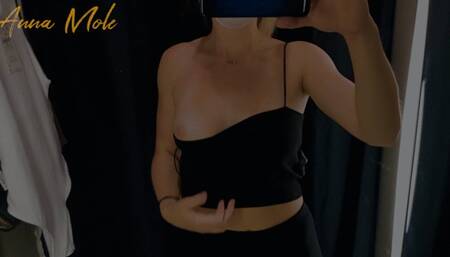 Dressing room trying on different clothes