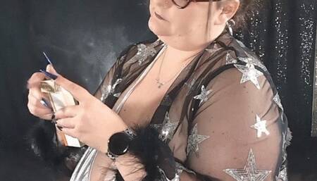 Smoking Virginia Slim 120s on star robe