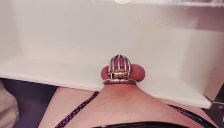 Sissy Pissing Thru Chastity Cage