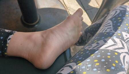 Fifi sole tease at a cafe barefoot in public