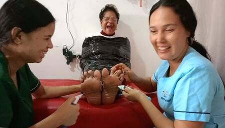 Nany is tickled on her soles: Double tickling