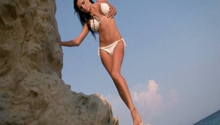 841 brunette Emma Black in beach nude