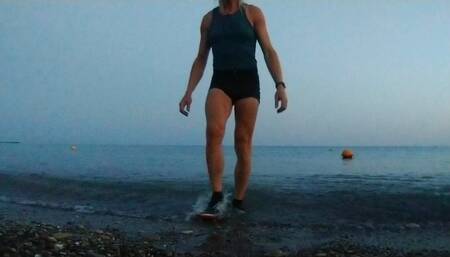 Alexa Cosmic Swimming in the Sea After Sunset in Clothes. Wetlook in Sneakers, Shorts and T-shirt