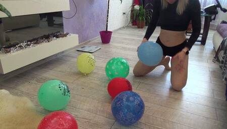 explodes balloons with naked belly1