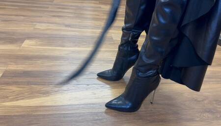 Lady encourages a slave to endure her dragontail whip