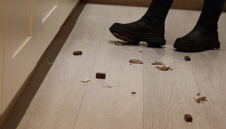 Crushing Reeses chocolates under my black boots