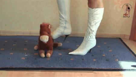 Stuffed Toy under High Heel Boots