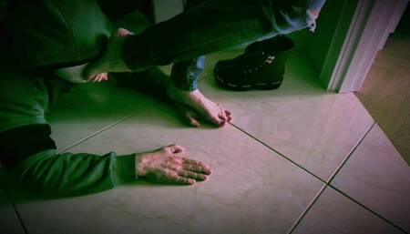 I put on my boots and step on his hands, walk with my bare feet on his hands (trample hands)