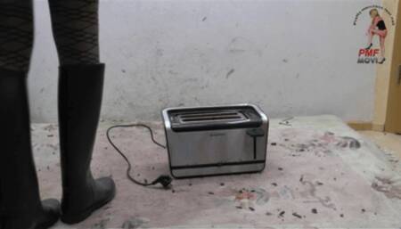 Toaster crushed under riding Boots