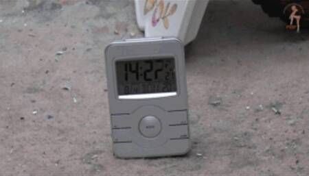 Clocks crushed under heavy New Rock Boots