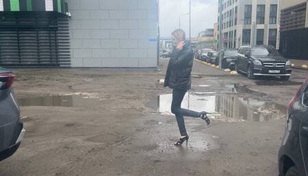 girl in high-heeled shoes with open toes like to pressing pedals in car with her high heels