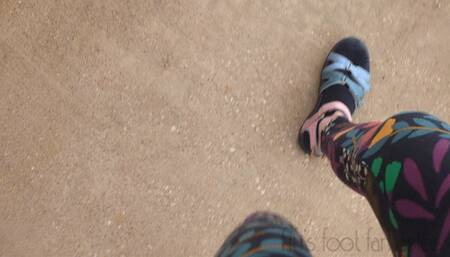 Fifi cranking in Teva sandals with black ankle socks and leggings replay