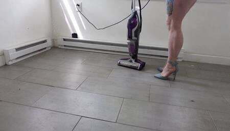 Muscular Calves and Legs in Blue Stilettos while Vacuuming in Natural Light MP4 480 Low res
