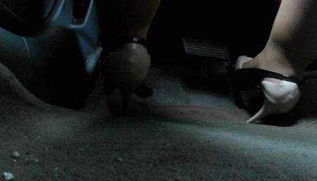 White and Black peep toes driving Honda Civic