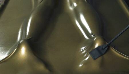 Bastinado and tickle in a gold latex bed
