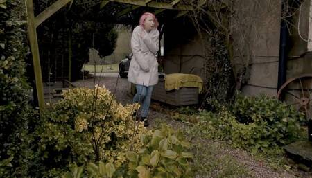 Monika wets her Jeans in the garden