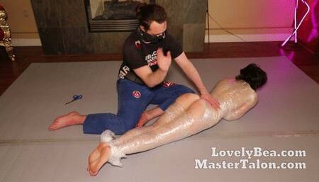 Saran Wrap Bondage Spanking she cant go anywhere