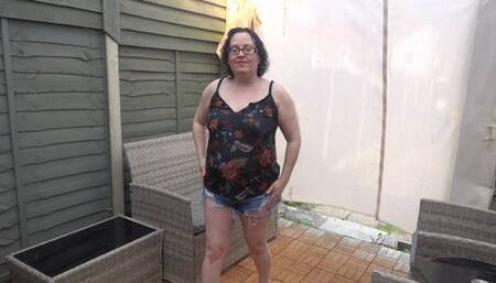 Sexy wife stripping in torn Denim shorts and bra