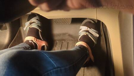 Fifi cranking her sedan in sandals with black socks replay