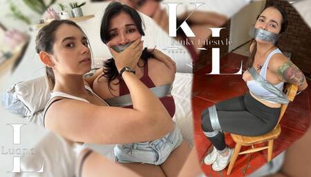 Luana Wanted to Steal Simona's Evidence (Duct Tape Bound & Gagged, Jean Shorts, Leggings, Tanktop, Sneakers, Chair Taped)