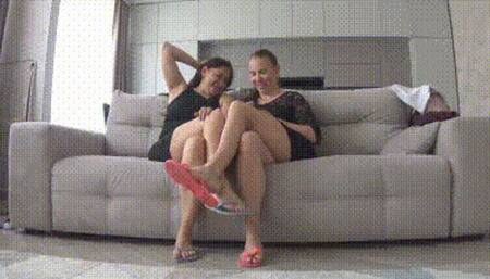 Crossed legs in flipflops