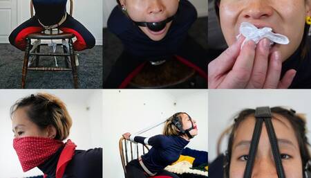 Young cute Chinese submissive girl in strict chair tie and multi gagged (mp4)