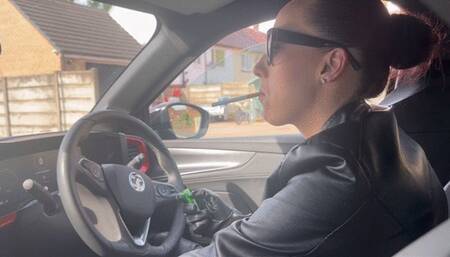 Driving and smoking in all leather outfit and gloves