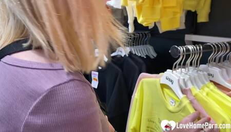 Gf gives a blowjob in the changing booth