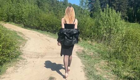 girl was walking and accidentally tripped, she fell, her heel broke and she twisted her leg