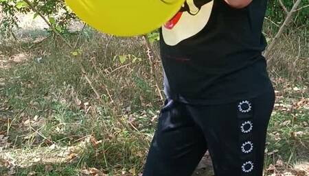 feet pop balloon on street