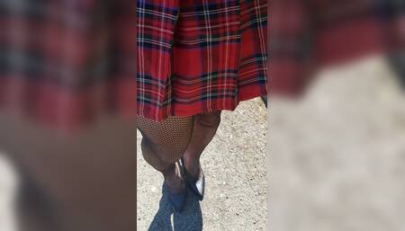 Playing in Fishnets and Skirt