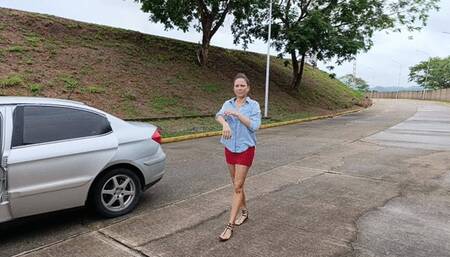 Katherine struggling with her driving lessons in sandals