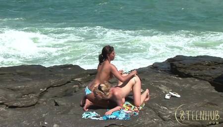 Two Lesbians Fingering Each Other on the Beach