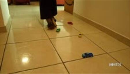 Mean goddess Evy crushes your favorite collectible toy cars and makes you kiss her shoes when done!