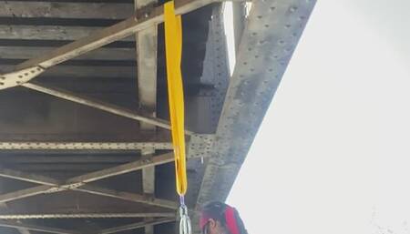 A Bridge Self Suspension: Enjoying the Cold River Water