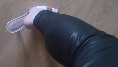 Manulady in mules, showing her muscle calves