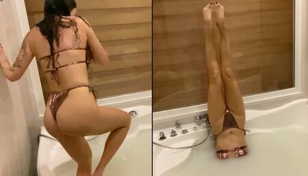 Jade holds her breath while standing upside down