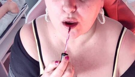 Applying red lipstick and sucking your cock