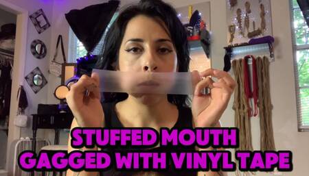 Stuffed Mouth Gagged with Vinyl Tape (Tapegagged)