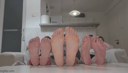 Two small feet between the big sole