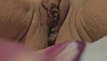 Milf playing with huge labia and rubbing her clit until orgasm