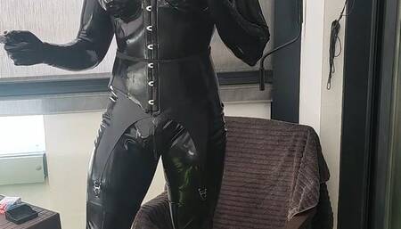 Tania smoking and masturbating full Latex encasement