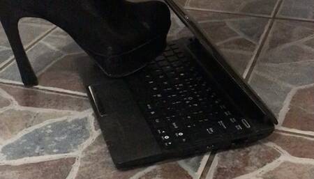 Metal tip heels destroy laptop after long day at work