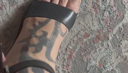 Trying a Tiny shoe on